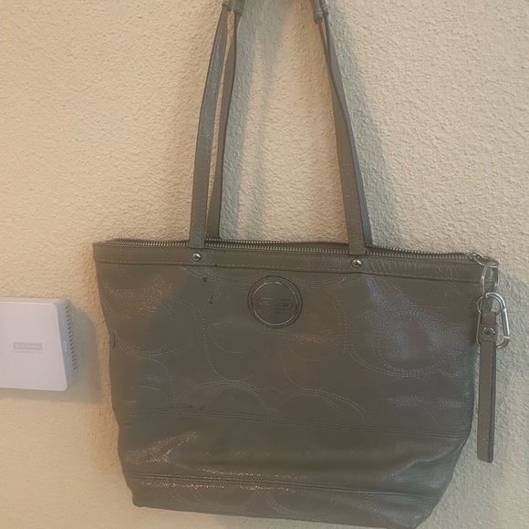 Coach Handbags - Coach Medium Metallic Grey Leather Vintage Bag